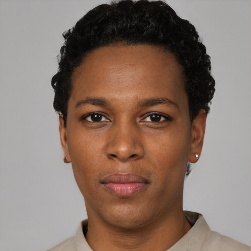 Neutral black young-adult female with short  black hair and brown eyes