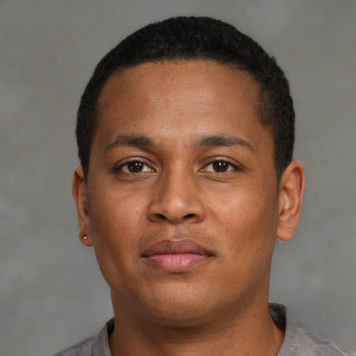 Neutral black young-adult male with short  black hair and brown eyes