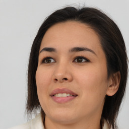 Joyful asian young-adult female with medium  brown hair and brown eyes