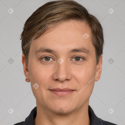 Joyful white adult male with short  brown hair and brown eyes