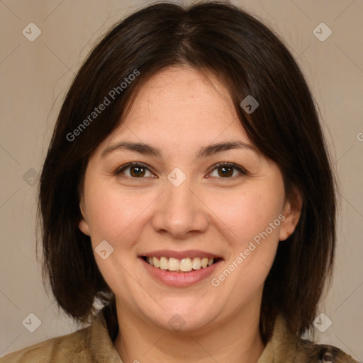 Joyful white adult female with medium  brown hair and brown eyes