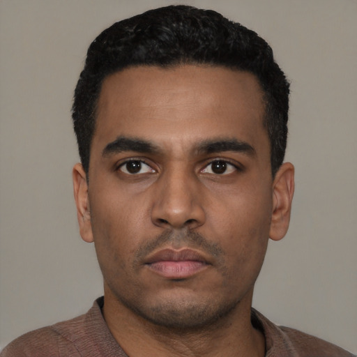 Neutral latino young-adult male with short  black hair and brown eyes