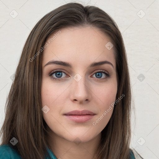 Joyful white young-adult female with long  brown hair and blue eyes