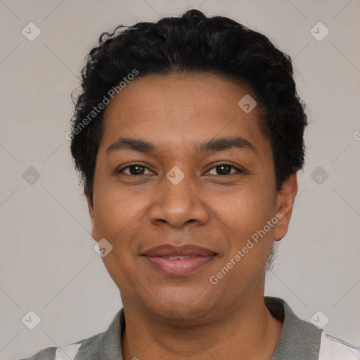 Joyful latino adult male with short  black hair and brown eyes