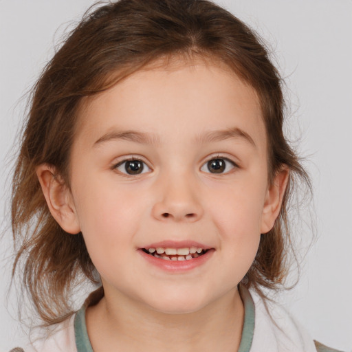 Joyful white child female with medium  brown hair and brown eyes