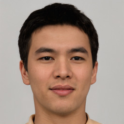 Neutral asian young-adult male with short  brown hair and brown eyes