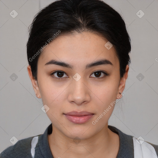 Joyful latino young-adult female with medium  brown hair and brown eyes