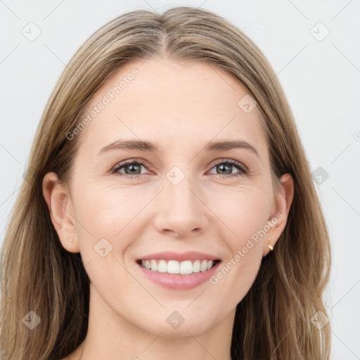 Joyful white young-adult female with long  brown hair and grey eyes