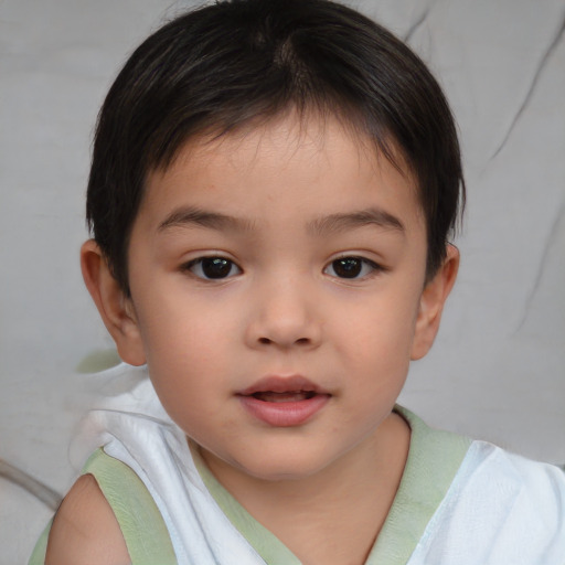 Joyful white child female with short  brown hair and brown eyes