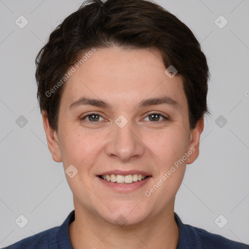 Joyful white young-adult female with short  brown hair and brown eyes