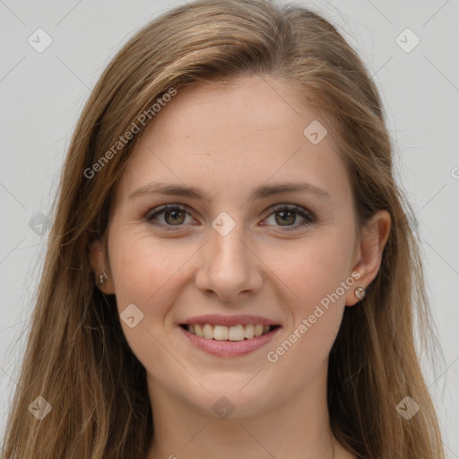 Joyful white young-adult female with long  brown hair and grey eyes