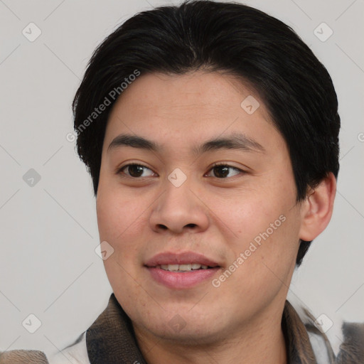 Joyful asian young-adult male with short  brown hair and brown eyes