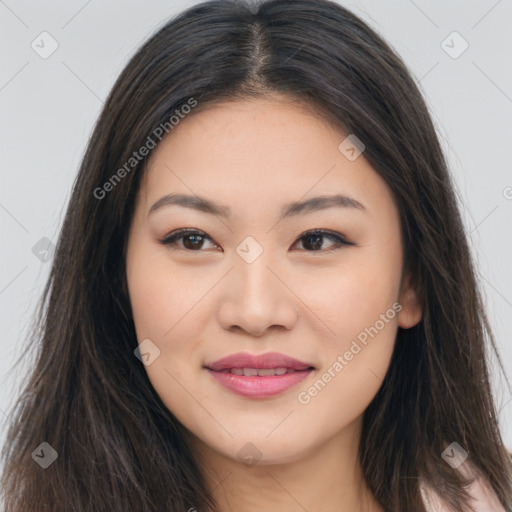 Joyful asian young-adult female with long  brown hair and brown eyes