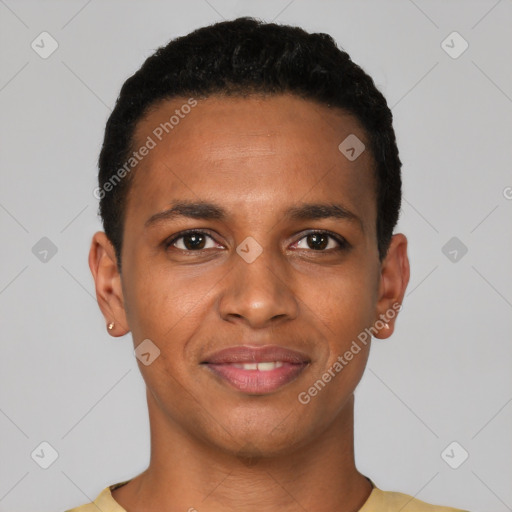 Joyful black young-adult male with short  black hair and brown eyes