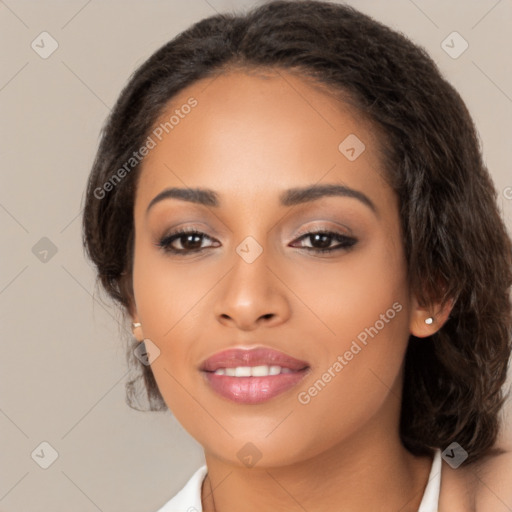 Joyful latino young-adult female with long  brown hair and brown eyes