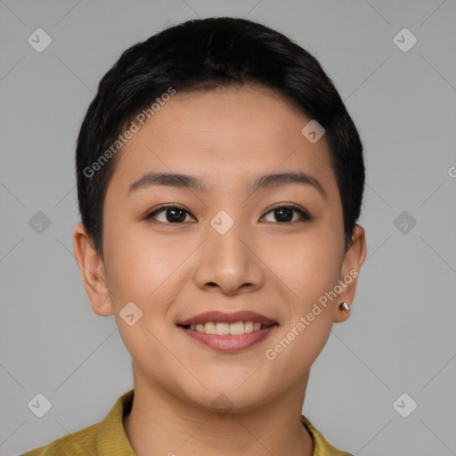 Joyful asian young-adult female with short  black hair and brown eyes