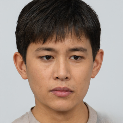 Neutral asian young-adult male with short  brown hair and brown eyes