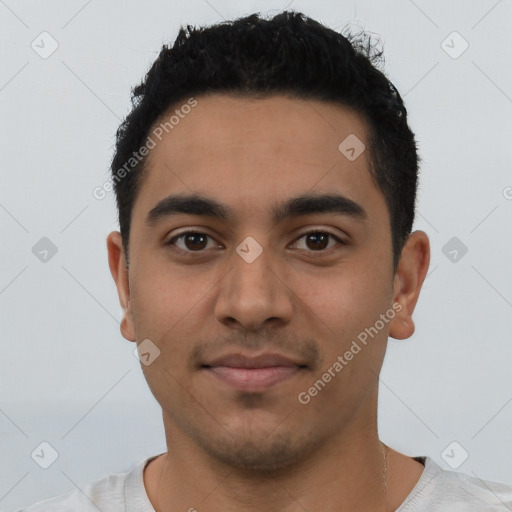 Neutral latino young-adult male with short  black hair and brown eyes