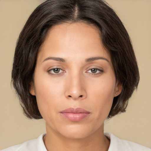 Neutral white young-adult female with medium  brown hair and brown eyes