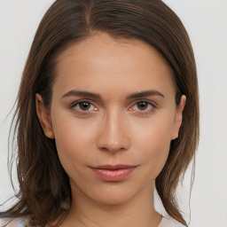 Neutral white young-adult female with medium  brown hair and brown eyes