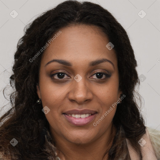 Joyful black young-adult female with long  brown hair and brown eyes