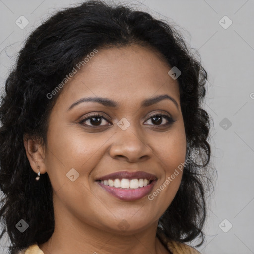 Joyful black young-adult female with long  brown hair and brown eyes