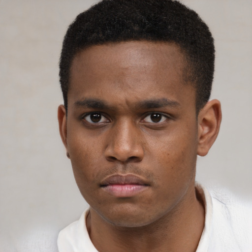 Neutral latino young-adult male with short  brown hair and brown eyes