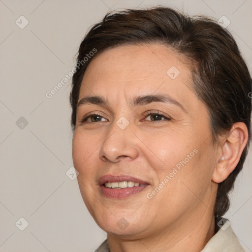 Joyful white adult female with medium  brown hair and brown eyes