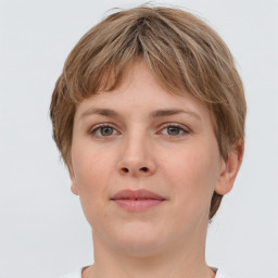 Neutral white young-adult female with short  brown hair and grey eyes