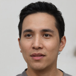 Neutral asian young-adult male with short  black hair and brown eyes