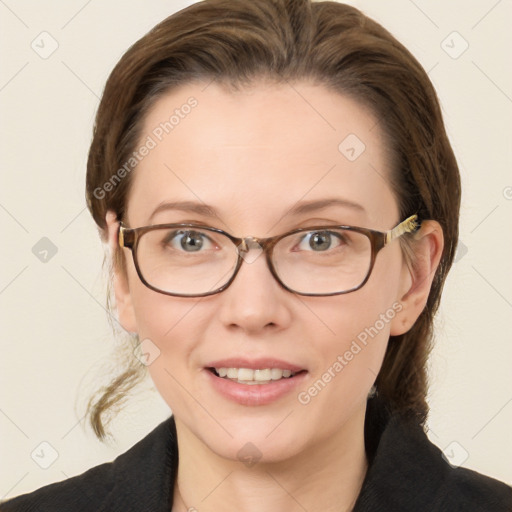 Joyful white young-adult female with medium  brown hair and blue eyes