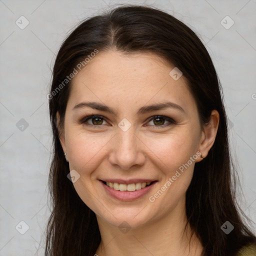 Joyful white young-adult female with long  brown hair and brown eyes