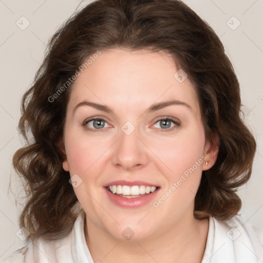 Joyful white young-adult female with medium  brown hair and green eyes