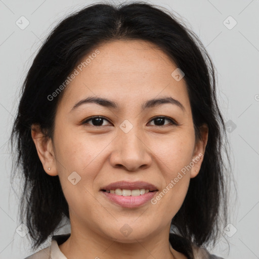 Joyful asian young-adult female with medium  brown hair and brown eyes