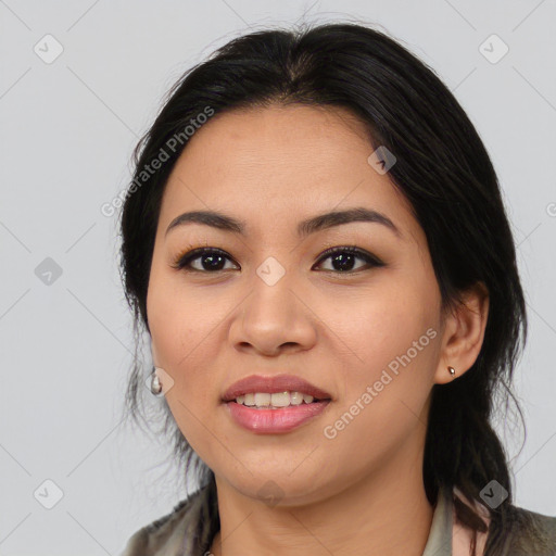 Joyful asian young-adult female with medium  black hair and brown eyes