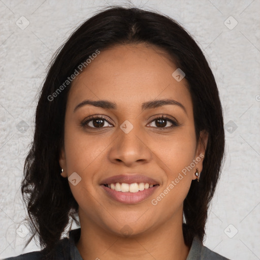 Joyful latino young-adult female with medium  brown hair and brown eyes