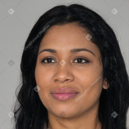 Joyful black young-adult female with long  black hair and brown eyes