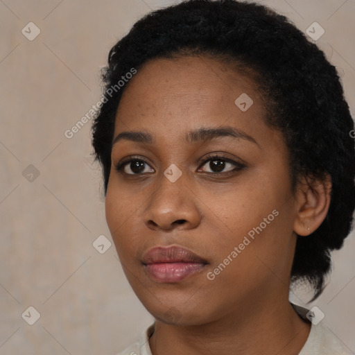 Neutral black young-adult female with medium  black hair and brown eyes