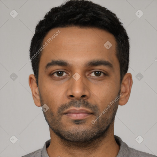 Neutral latino young-adult male with short  black hair and brown eyes
