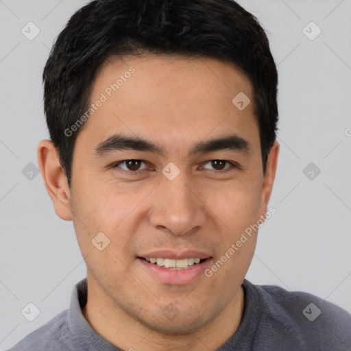 Joyful latino young-adult male with short  brown hair and brown eyes