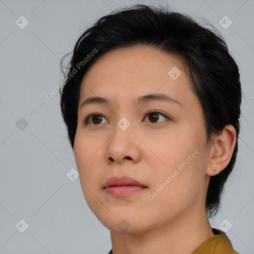 Neutral asian young-adult female with medium  brown hair and brown eyes