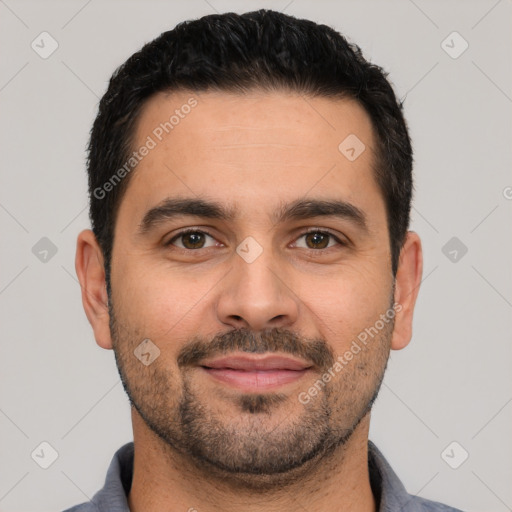 Joyful white young-adult male with short  black hair and brown eyes