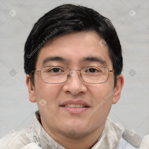 Joyful white young-adult male with short  black hair and brown eyes