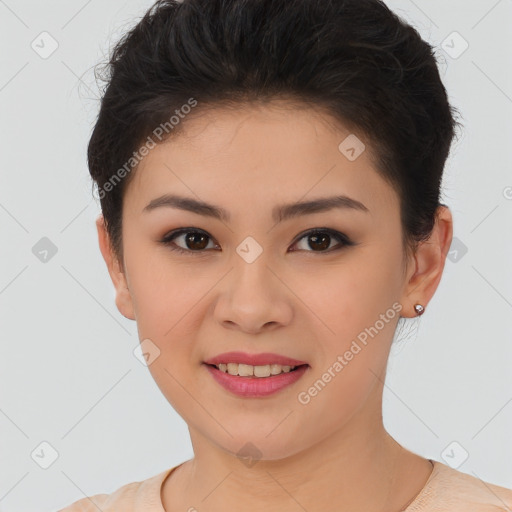 Joyful asian young-adult female with short  brown hair and brown eyes