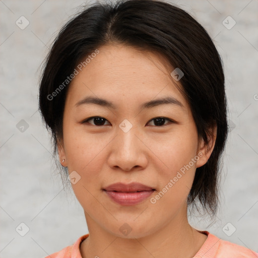 Joyful asian young-adult female with medium  brown hair and brown eyes