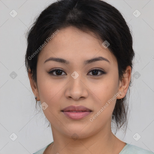 Joyful latino young-adult female with medium  brown hair and brown eyes