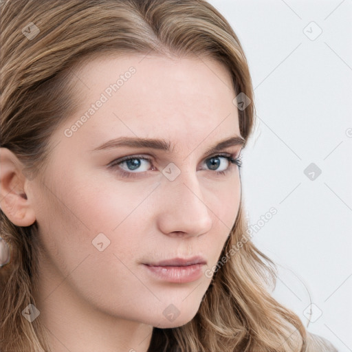 Neutral white young-adult female with long  brown hair and blue eyes