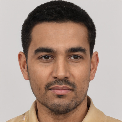 Neutral latino young-adult male with short  black hair and brown eyes