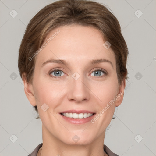 Joyful white young-adult female with short  brown hair and grey eyes