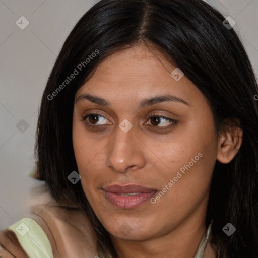 Joyful latino young-adult female with medium  brown hair and brown eyes